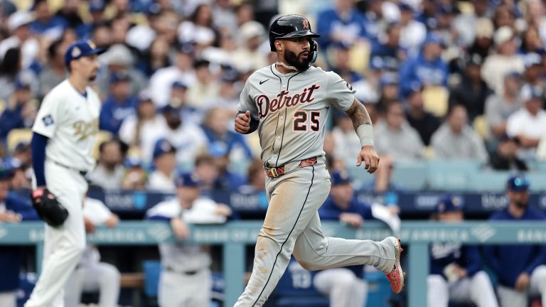 LOS ANGELES, CALIFORNIA - MARCH 27: Gleyber Torres #25 of the Detroit Tigers reacts while scoring in the fifth inning against the Los Angeles Dodgers on Opening Day at Dodger Stadium on March 27, 2025 in Los Angeles, California. (Photo by Harry How/Getty Images)