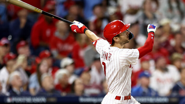 PHILADELPHIA, PENNSYLVANIA - OCTOBER 11: Trea Turner #7 of the Philadelphia Phillies hits a solo home run against the Atlanta Braves during the sixth inning in Game Three of the Division Series at Citizens Bank Park on October 11, 2023 in Philadelphia, Pennsylvania. (Photo by Tim Nwachukwu/Getty Images)