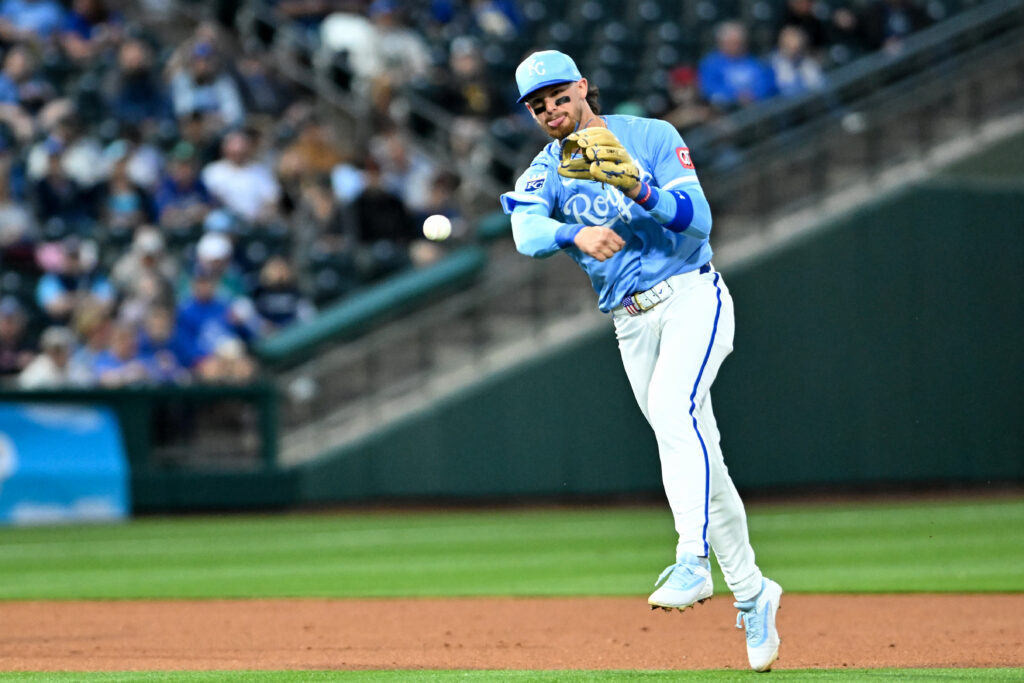 SURPRISE, ARIZONA - MARCH 05, 2025: Bobby Witt Jr. #7 of the Kansas City Royals throws to first base during the second inning of a spring training game against the Seattle Mariners at Surprise Stadium on March 05, 2025 in Surprise, Arizona. (Photo by David Durochik/Diamond Images via Getty Images)
