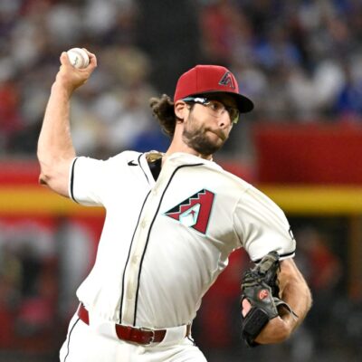 PHOENIX, ARIZONA - MARCH 27: Zac Gallen #23 of the Arizona Diamondbacks pitches in the second inning against the Chicago Cubs on Opening Day at Chase Field on March 27, 2025 in Phoenix, Arizona. (Photo by Norm Hall/Getty Images)