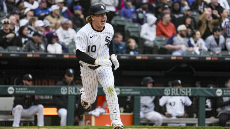 Chase Meidroth #10 of the Chicago White Sox runs to first base during the eighth inning of the game against the Boston Red Sox at Rate Field