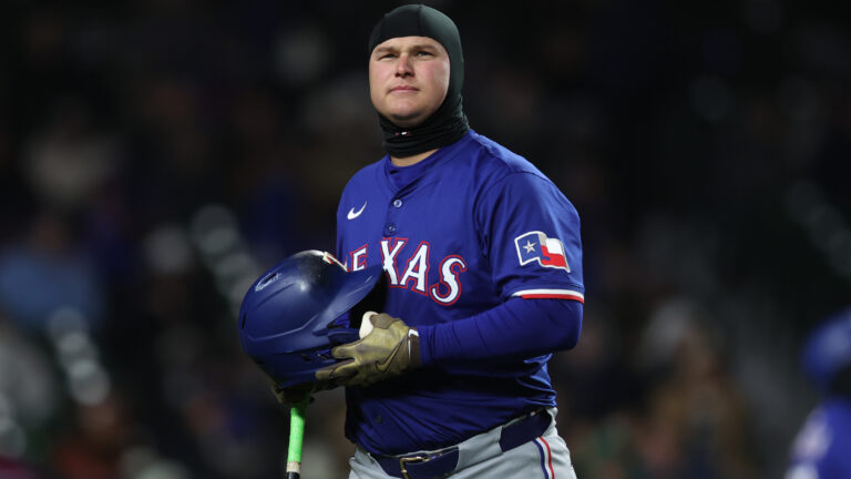 CHICAGO, ILLINOIS - APRIL 8: Joc Pederson #4 of the Texas Rangers looks on during a game against the Chicago Cubs at Wrigley Field on April 8, 2025 in Chicago, Illinois. (Photo by Geoff Stellfox/Getty Images)
