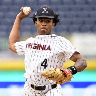 Jay Woolfolk of the Virginia Cavaliers throws a pitch against the North Carolina Tar Heels in the eighth inning during the ACC Baseball Championship at Durham Bulls Athletic Park.