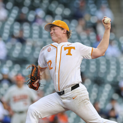 Liam Doyle of the Tennessee Volunteers throws a pitch in the fourth inning against the Oklahoma State Cowboys in the Astros Foundation College Classic at Daikin Park.