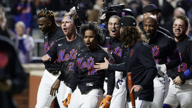 NEW YORK, NEW YORK - APRIL 18: Francisco Lindor #12 of the New York Mets celebrates his ninth inning game winning home run against the St. Louis Cardinals with his teammates at Citi Field on April 18, 2025 in New York City. (Photo by Jim McIsaac/Getty Images)