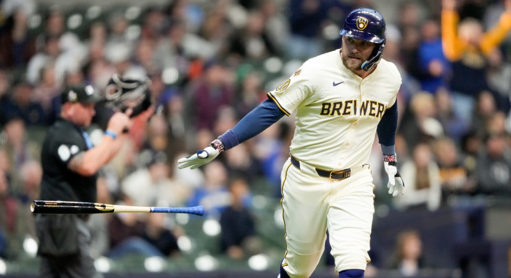 MILWAUKEE, WI - APRIL 15:   Rhys Hoskins #12 of the Milwaukee Brewers drops his bat after hitting a solo home run in the second inning during the game between the Detroit Tigers and the Milwaukee Brewers at American Family Field on Tuesday, April 15, 2025 in Milwaukee, Wisconsin. (Photo by Aaron Gash/MLB Photos via Getty Images)