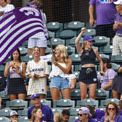 FAYETTEVILLE, ARKANSAS - JUNE 02: Fans of the Kansas State Wildcats cheer during the NCAA Division 1 Baseball Regional tournament against the Southeast Missouri Redhawks at Baum Walker Stadium on June 02, 2024 in Fayetteville, Arkansas. The Wildcats defeated the Redhawks 7-2. (Photo by Wesley Hitt/Getty Images)