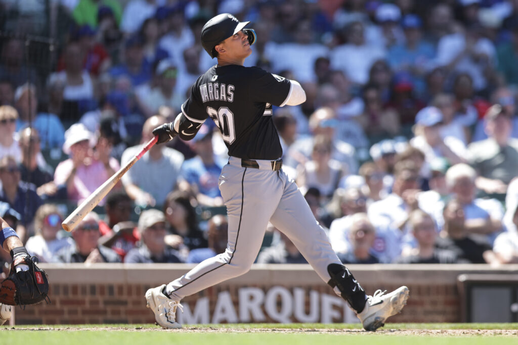 CHICAGO, ILLINOIS - MAY 16: Miguel Vargas #20 of the Chicago White Sox hits a home run during the third inning against the Chicago Cubs at Wrigley Field on May 16, 2025 in Chicago, Illinois. (Photo by Geoff Stellfox/Getty Images)