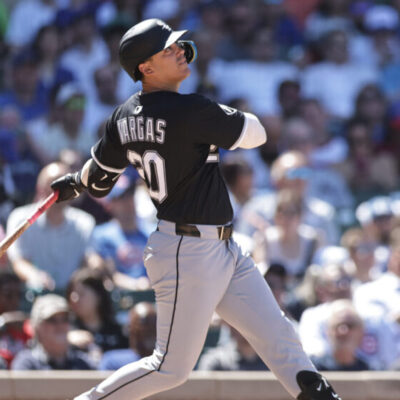 CHICAGO, ILLINOIS - MAY 16: Miguel Vargas #20 of the Chicago White Sox hits a home run during the third inning against the Chicago Cubs at Wrigley Field on May 16, 2025 in Chicago, Illinois. (Photo by Geoff Stellfox/Getty Images)