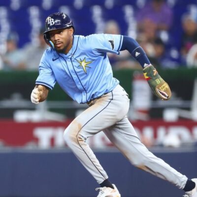 MIAMI, FLORIDA - MAY 17: Chandler Simpson #14 of the Tampa Bay Rays runs to second base against the Miami Marlins in the ninth inning of the game at loanDepot park on May 17, 2025 in Miami, Florida. (Photo by Megan Briggs/Getty Images)