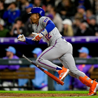 DENVER, CO - JUNE 6: New York Mets shortstop Francisco Lindor (12) hits a pinch hit 2-run double in the ninth inning during a game between the New York Mets and the Colorado Rockies at Coors Field on June 6, 2025 in Denver, Colorado. (Photo by Dustin Bradford/Icon Sportswire via Getty Images)