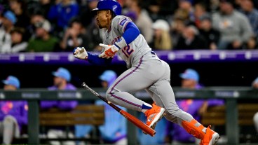 DENVER, CO - JUNE 6: New York Mets shortstop Francisco Lindor (12) hits a pinch hit 2-run double in the ninth inning during a game between the New York Mets and the Colorado Rockies at Coors Field on June 6, 2025 in Denver, Colorado. (Photo by Dustin Bradford/Icon Sportswire via Getty Images)
