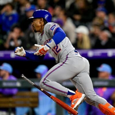 DENVER, CO - JUNE 6: New York Mets shortstop Francisco Lindor (12) hits a pinch hit 2-run double in the ninth inning during a game between the New York Mets and the Colorado Rockies at Coors Field on June 6, 2025 in Denver, Colorado. (Photo by Dustin Bradford/Icon Sportswire via Getty Images)
