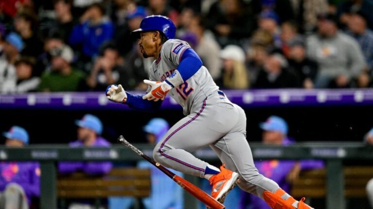 DENVER, CO - JUNE 6: New York Mets shortstop Francisco Lindor (12) hits a pinch hit 2-run double in the ninth inning during a game between the New York Mets and the Colorado Rockies at Coors Field on June 6, 2025 in Denver, Colorado. (Photo by Dustin Bradford/Icon Sportswire via Getty Images)