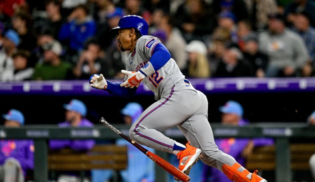 DENVER, CO - JUNE 6: New York Mets shortstop Francisco Lindor (12) hits a pinch hit 2-run double in the ninth inning during a game between the New York Mets and the Colorado Rockies at Coors Field on June 6, 2025 in Denver, Colorado. (Photo by Dustin Bradford/Icon Sportswire via Getty Images)