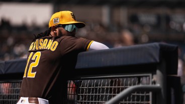 PEORIA, ARIZONA - MARCH 16: Luis Campusano #12 of the San Diego Padres stands in the dugout during a spring training game against the Arizona Diamondbacks at Peoria Stadium on March 16, 2025 in Peoria, Arizona. (Photo by Matt Thomas/San Diego Padres/Getty Images)