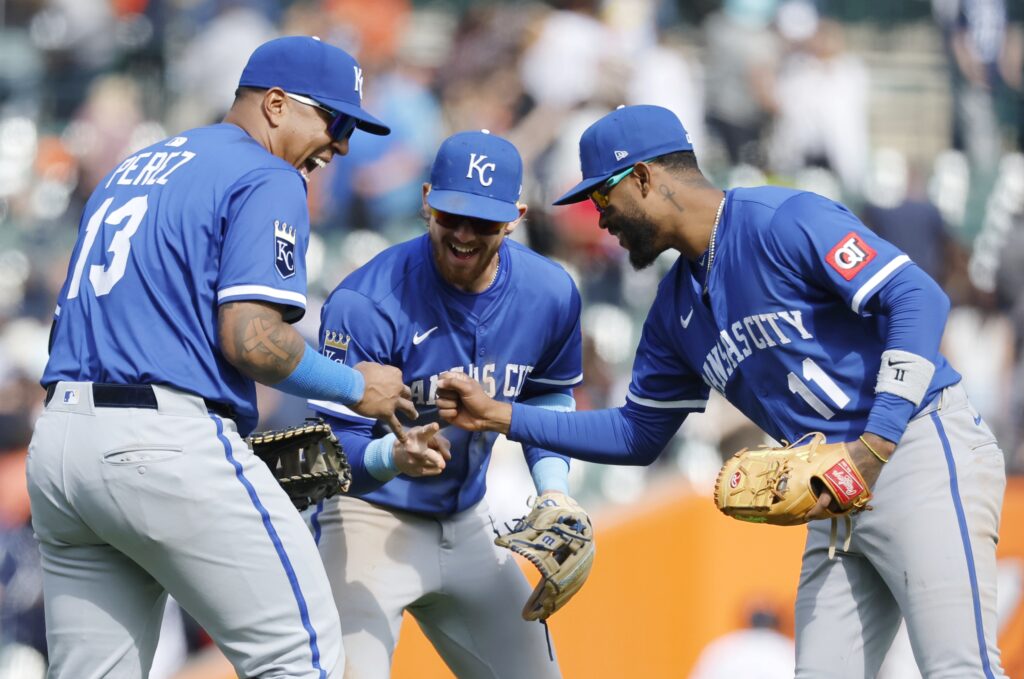 DETROIT, MI - APRIL 20: Salvador Perez #13 of the Kansas City Royals, Bobby Witt Jr. #7 and Maikel Garcia #11 celebrate after a 4-3 win over the Detroit Tigers in 10 innings at Comerica Park on April 20, 2025 in Detroit, Michigan. (Photo by Duane Burleson/Getty Images)