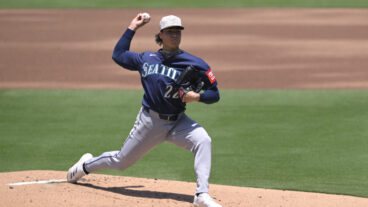 SAN DIEGO, CALIFORNIA - MAY 18: Bryan Woo #22 of the Seattle Mariners pitches against the San Diego Padres during the first inning at Petco Park on May 18, 2025 in San Diego, California. (Photo by Orlando Ramirez/Getty Images)