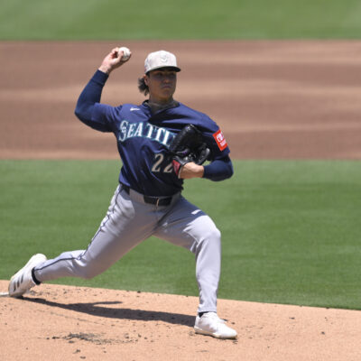 SAN DIEGO, CALIFORNIA - MAY 18: Bryan Woo #22 of the Seattle Mariners pitches against the San Diego Padres during the first inning at Petco Park on May 18, 2025 in San Diego, California. (Photo by Orlando Ramirez/Getty Images)