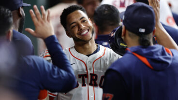 Jeremy Peña of the Houston Astros celebrates after hitting a two-run home run during the second inning against the Athletics at Daikin Park.