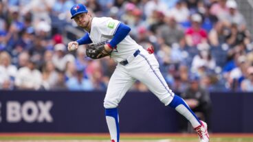 TORONTO, ON - JUNE 19: Ernie Clement #22 of Toronto Blue Jays fields a ball against the Arizona Diamondbacks during the fifth inning in their MLB game at the Rogers Centre on June 19, 2025 in Toronto, Ontario, Canada. (Photo by Mark Blinch/Getty Images)