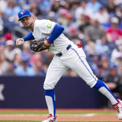 TORONTO, ON - JUNE 19: Ernie Clement #22 of Toronto Blue Jays fields a ball against the Arizona Diamondbacks during the fifth inning in their MLB game at the Rogers Centre on June 19, 2025 in Toronto, Ontario, Canada. (Photo by Mark Blinch/Getty Images)