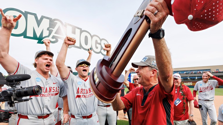 FAYETTEVILLE, ARKANSAS - JUNE 08: Head Coach Dave Van Horn of the Arkansas Razorbacks celebrates after winning the Super Regional and a trip to the College World Series after beating the Tennessee Volunteers at Baum-Walker Stadium at George Cole Field during the NCAA Baseball Super Regional - Fayetteville on June 08, 2025 in Fayetteville, Arkansas. The Razorbacks defeated the Volunteers 11-4. (Photo by Wesley Hitt/Getty Images)