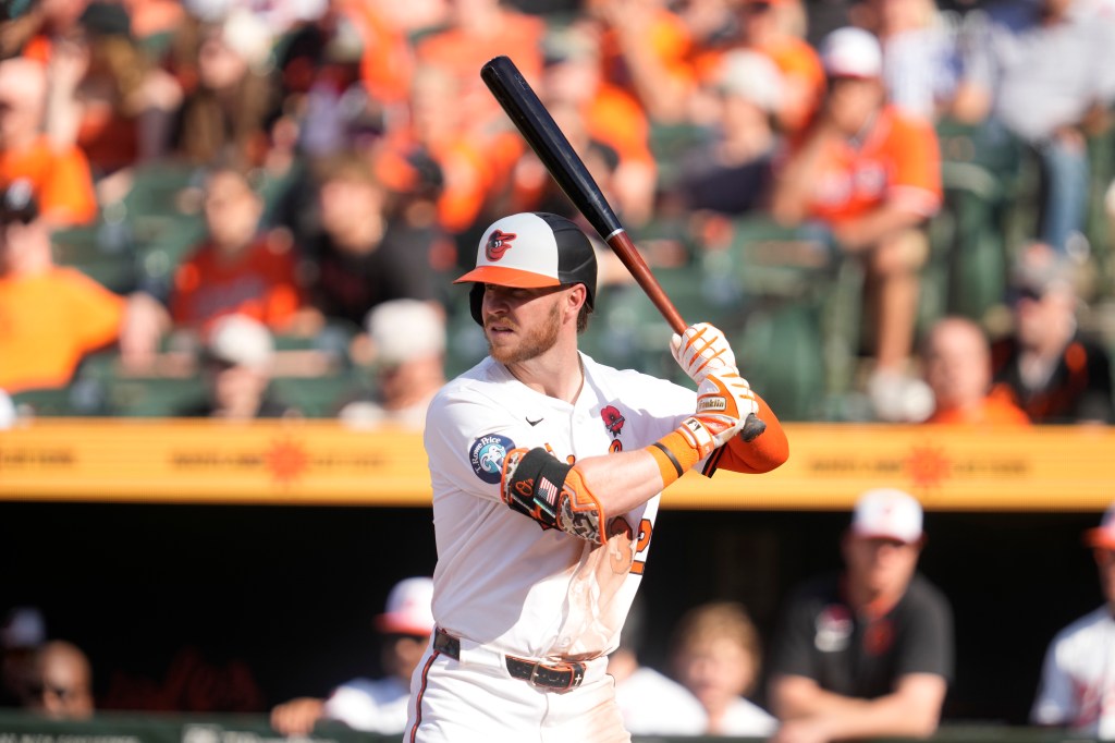 Ryan O'Hearn of the Baltimore Orioles prepares for a pitch during a baseball game against the St. Louis Cardinals at Oriole Park at Camden Yards.