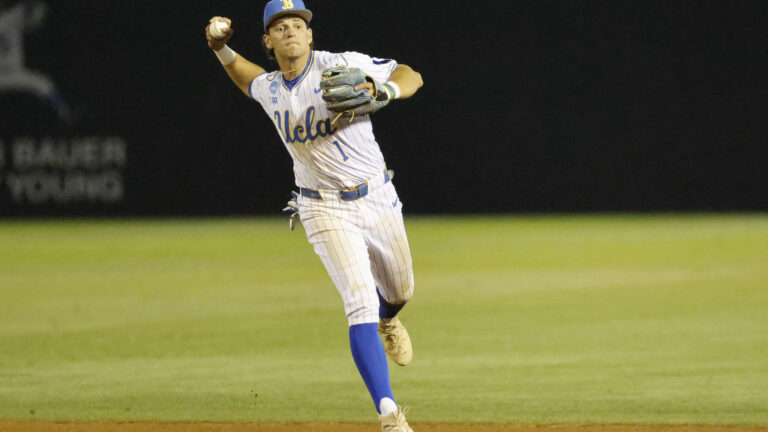 UCLA infielder Roch Cholowsky fields the ball at the NCAA baseball regional tournament game between UCLA and UC Irvine at Jackie Robinson Stadium.