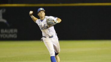 UCLA infielder Roch Cholowsky fields the ball at the NCAA baseball regional tournament game between UCLA and UC Irvine at Jackie Robinson Stadium.