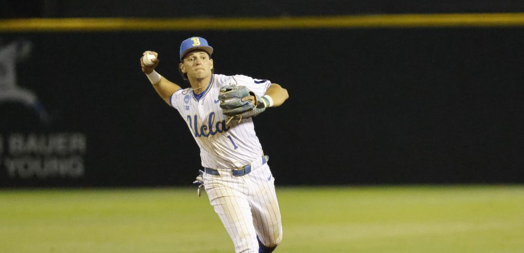 UCLA infielder Roch Cholowsky fields the ball at the NCAA baseball regional tournament game between UCLA and UC Irvine at Jackie Robinson Stadium.