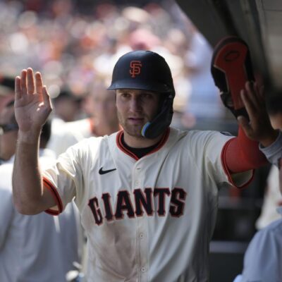 SAN FRANCISCO, CALIFORNIA - JUNE 22: Casey Schmitt #10 of the San Francisco Giants celebrates in the dugout after scoring a run during the game at Oracle Park on June 22, 2025 in San Francisco, California. (Photo by Andy Kuno/San Francisco Giants/Getty Images)