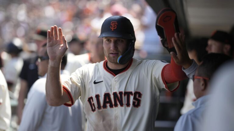 SAN FRANCISCO, CALIFORNIA - JUNE 22: Casey Schmitt #10 of the San Francisco Giants celebrates in the dugout after scoring a run during the game at Oracle Park on June 22, 2025 in San Francisco, California. (Photo by Andy Kuno/San Francisco Giants/Getty Images)