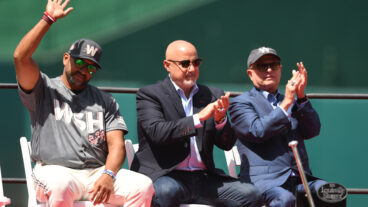 WASHINGTON, DC - JUNE 18: (L-R) Manger Dave Martinez #4, General Manager Mike Rizzo, and Principle Owner Mark Lerner of the Washington Nationals cheer during Ryan Zimmerman retirement ceremony before a baseball game against the Philadelphia Phillies at Nationals Park in Washington, DC. (Photo by Mitchell Layton/Getty Images)