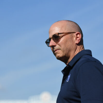 TAMPA, FLORIDA - MARCH 14: Brian Cashman, general manager and senior vice president of the New York Yankees, before a spring training game against the Philadelphia Phillies at George M. Steinbrenner Field on March 14, 2025 in Tampa, Florida. (Photo by Mark Taylor/Getty Images)