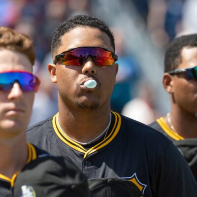 CLEARWATER, MEXICO - MARCH 14: Esmerlyn Valdez #23 of the Pittsburgh Pirates stands for the national anthem prior to the game between the Pittsburgh Pirates and the Philadelphia Phillies at BayCare Ballpark on Friday, March 14, 2025 in Clearwater, Florida. (Photo by Mike Carlson/MLB Photos via Getty Images)
