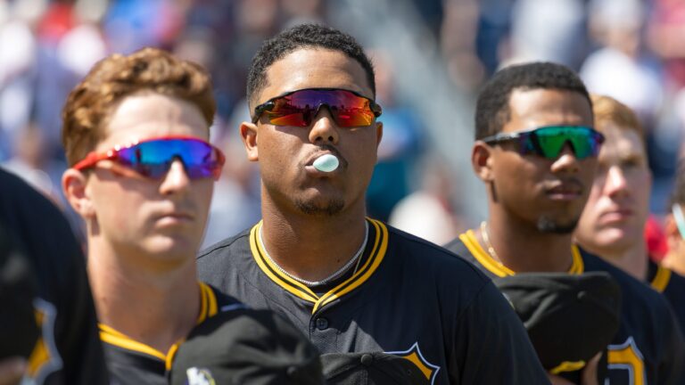 CLEARWATER, MEXICO - MARCH 14: Esmerlyn Valdez #23 of the Pittsburgh Pirates stands for the national anthem prior to the game between the Pittsburgh Pirates and the Philadelphia Phillies at BayCare Ballpark on Friday, March 14, 2025 in Clearwater, Florida. (Photo by Mike Carlson/MLB Photos via Getty Images)