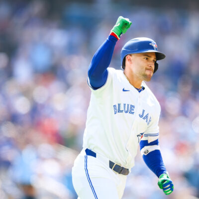 TORONTO, CANADA - JULY 5: George Springer #4 of the Toronto Blue Jays reacts as he rounds the bases on a two-run home run to score in Nathan Lukes #38 in the third inning of their MLB game against the Los Angeles Angels at Rogers Centre on July 5, 2025 in Toronto, Ontario, Canada. (Photo by Cole Burston/Getty Images)