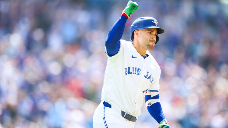 TORONTO, CANADA - JULY 5: George Springer #4 of the Toronto Blue Jays reacts as he rounds the bases on a two-run home run to score in Nathan Lukes #38 in the third inning of their MLB game against the Los Angeles Angels at Rogers Centre on July 5, 2025 in Toronto, Ontario, Canada. (Photo by Cole Burston/Getty Images)