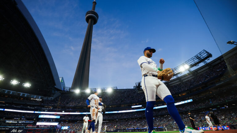 TORONTO, CANADA - JULY 22: Bo Bichette #11 of the Toronto Blue Jays walks to the dugout in the middle of the sixth inning of their MLB game against the New York Yankees at Rogers Centre on July 22, 2025 in Toronto, Ontario, Canada. (Photo by Cole Burston/Getty Images)