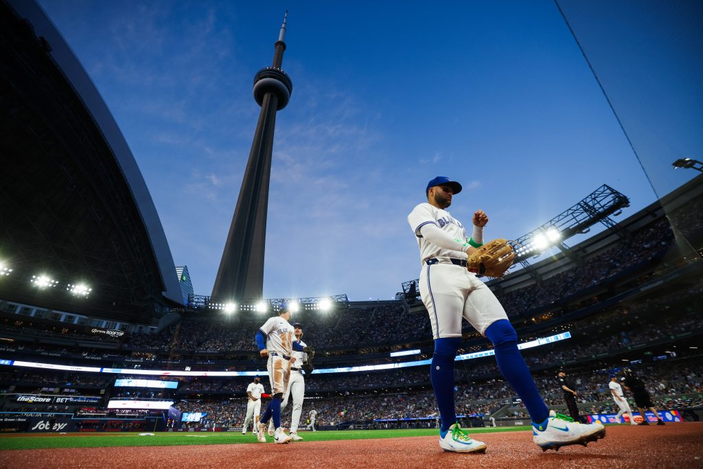 TORONTO, CANADA - JULY 22: Bo Bichette #11 of the Toronto Blue Jays walks to the dugout in the middle of the sixth inning of their MLB game against the New York Yankees at Rogers Centre on July 22, 2025 in Toronto, Ontario, Canada. (Photo by Cole Burston/Getty Images)