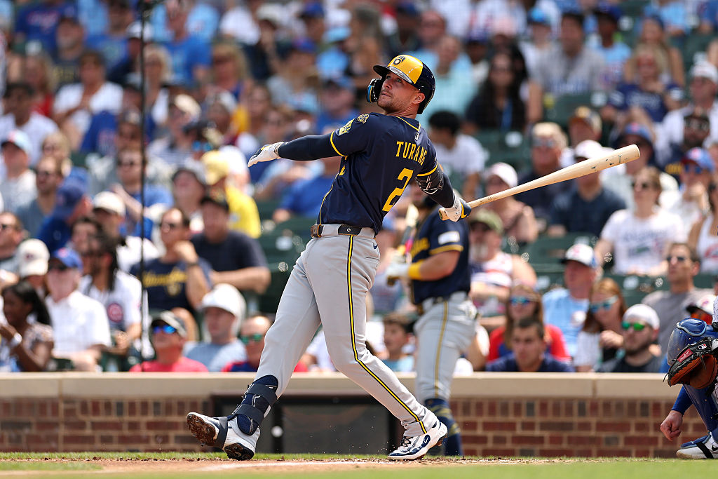 CHICAGO, ILLINOIS - AUGUST 18: Brice Turang #2 of the Milwaukee Brewers hits a solo home run against the Chicago Cubs during the third inning in game one of a doubleheader at Wrigley Field on August 18, 2025 in Chicago, Illinois. (Photo by Luke Hales/Getty Images)