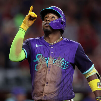 PHOENIX, ARIZONA - AUGUST 23: Geraldo Perdomo #2 of the Arizona Diamondbacks reacts while crossing home plate after hitting a two run home run against the Cincinnati Reds during the fourth inning at Chase Field on August 23, 2025 in Phoenix, Arizona. (Photo by Chris Coduto/Getty Images)