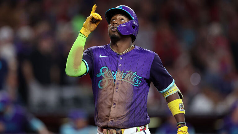 PHOENIX, ARIZONA - AUGUST 23: Geraldo Perdomo #2 of the Arizona Diamondbacks reacts while crossing home plate after hitting a two run home run against the Cincinnati Reds during the fourth inning at Chase Field on August 23, 2025 in Phoenix, Arizona. (Photo by Chris Coduto/Getty Images)