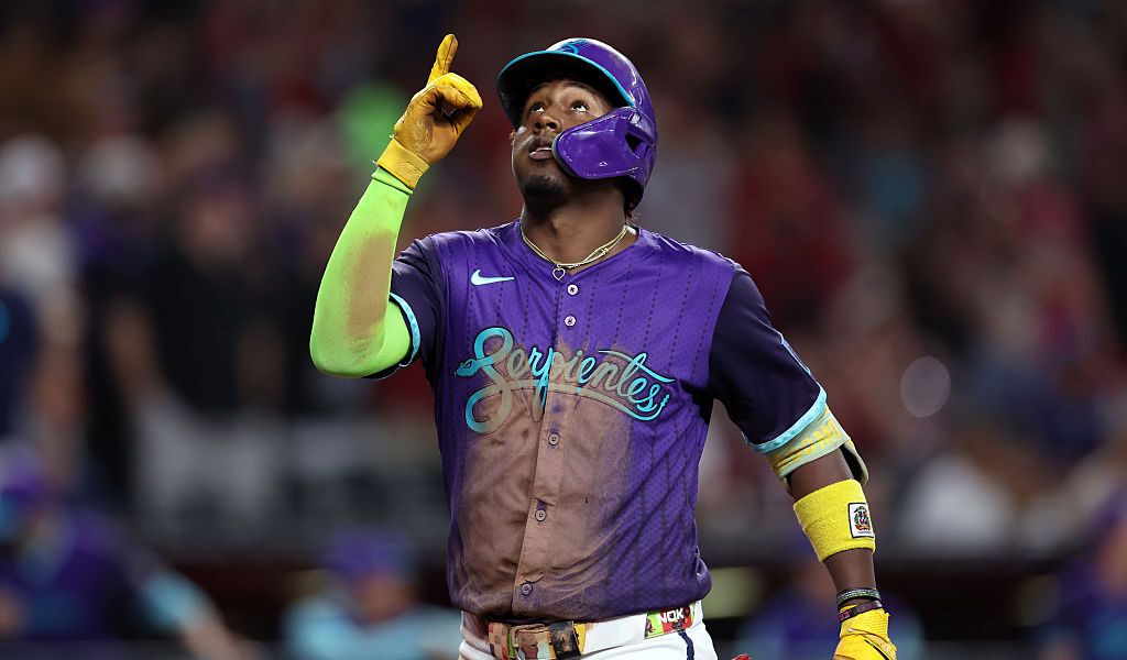 PHOENIX, ARIZONA - AUGUST 23: Geraldo Perdomo #2 of the Arizona Diamondbacks reacts while crossing home plate after hitting a two run home run against the Cincinnati Reds during the fourth inning at Chase Field on August 23, 2025 in Phoenix, Arizona. (Photo by Chris Coduto/Getty Images)