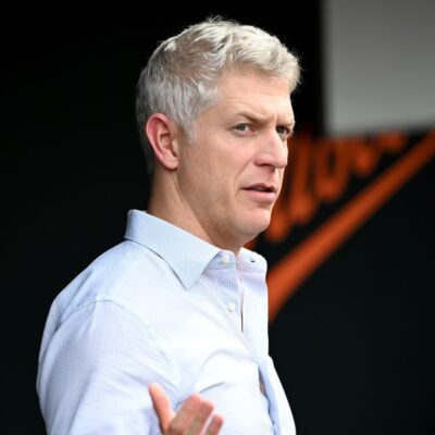 BALTIMORE, MARYLAND - JUNE 13: General Manager Mike Elias of the Baltimore Orioles watches batting practice before the game against the Los Angeles Angels at Oriole Park at Camden Yards on June 13, 2025 in Baltimore, Maryland. (Photo by G Fiume/Getty Images)