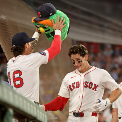 Boston, MA - July 7 - Jarren Duran (16) of the Boston Red Sox puts the Wally head on Roman Anthony after his two run homer during the fifth inning of the MLB game against the Colorado Rockies at Fenway Park. (Photo by Matt Stone/MediaNews Group/Boston Herald via Getty Images)