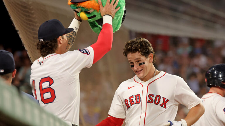 Boston, MA - July 7 - Jarren Duran (16) of the Boston Red Sox puts the Wally head on Roman Anthony after his two run homer during the fifth inning of the MLB game against the Colorado Rockies at Fenway Park. (Photo by Matt Stone/MediaNews Group/Boston Herald via Getty Images)