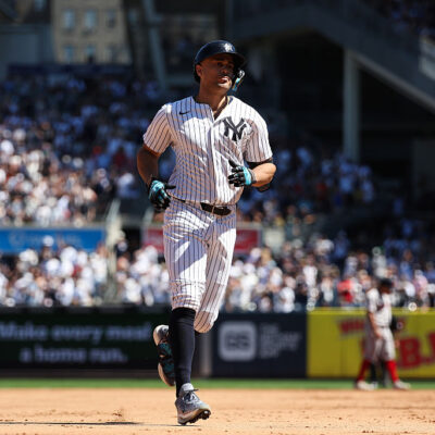 NEW YORK, NY - AUGUST 23: Giancarlo Stanton #27 of the New York Yankees reacts after hitting a home run during the game against the Boston Red Sox at Yankee Stadium on August 23, 2025 in New York, New York. (Photo by New York Yankees/Getty Images)