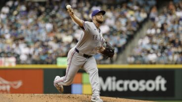 SEATTLE, WASHINGTON - AUGUST 02: Merrill Kelly #23 of the Texas Rangers throws a pitch during the third inning against the Seattle Mariners at T-Mobile Park on August 02, 2025 in Seattle, Washington. (Photo by Alika Jenner/Getty Images)